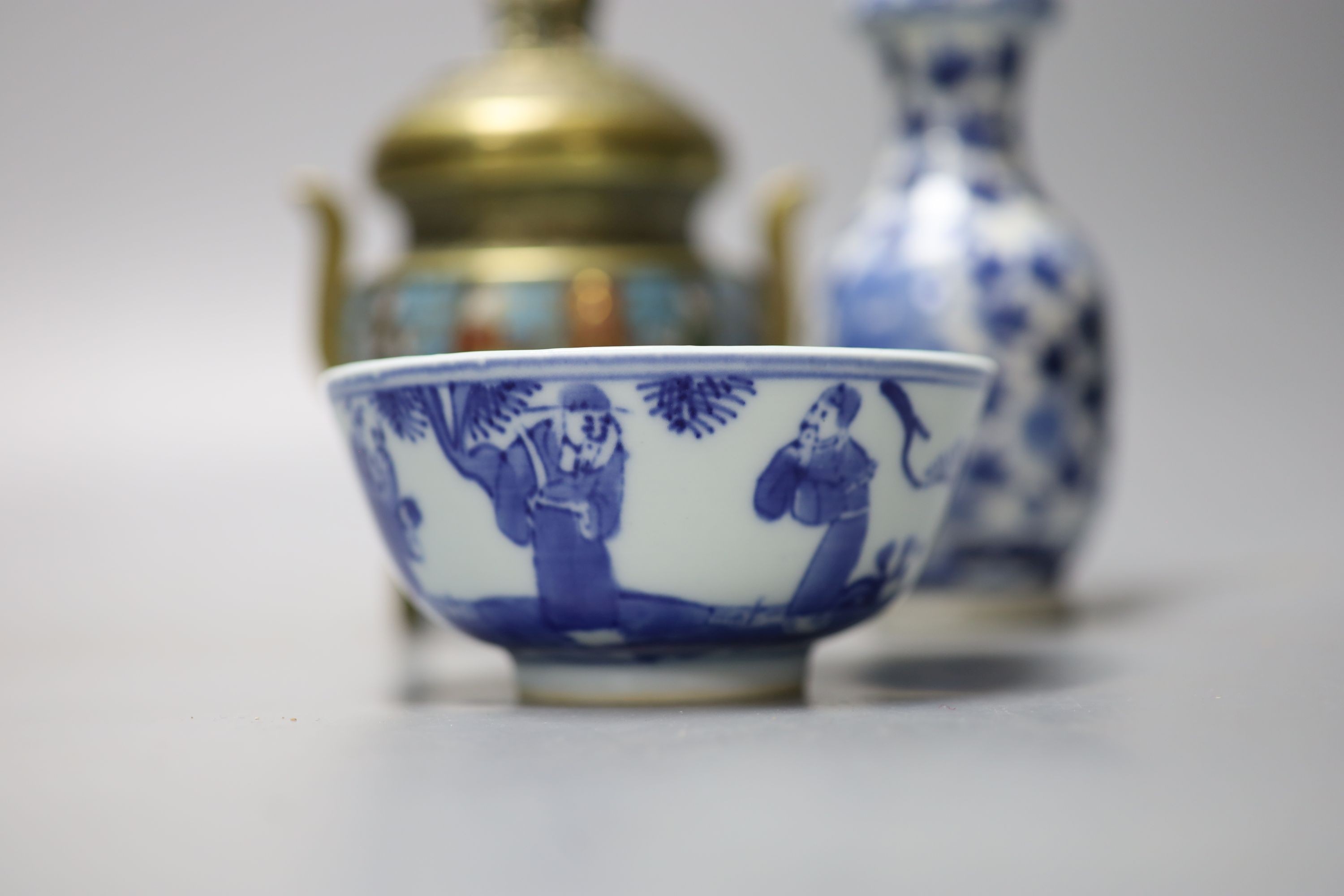 A group of Chinese porcelain, 19th /20th century, to include a pair of yellow ground bowls, 10.8 cm diameter, a blue and white vase, Xuande mark, a similar bowl and vase, and a champleve enamel bronze koro and cover
